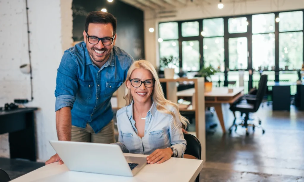 Two creative small business owners at work -